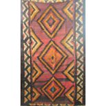 A Lori runner with diamond geometric pattern in orange and pink hues. 210cm x 210cm approx