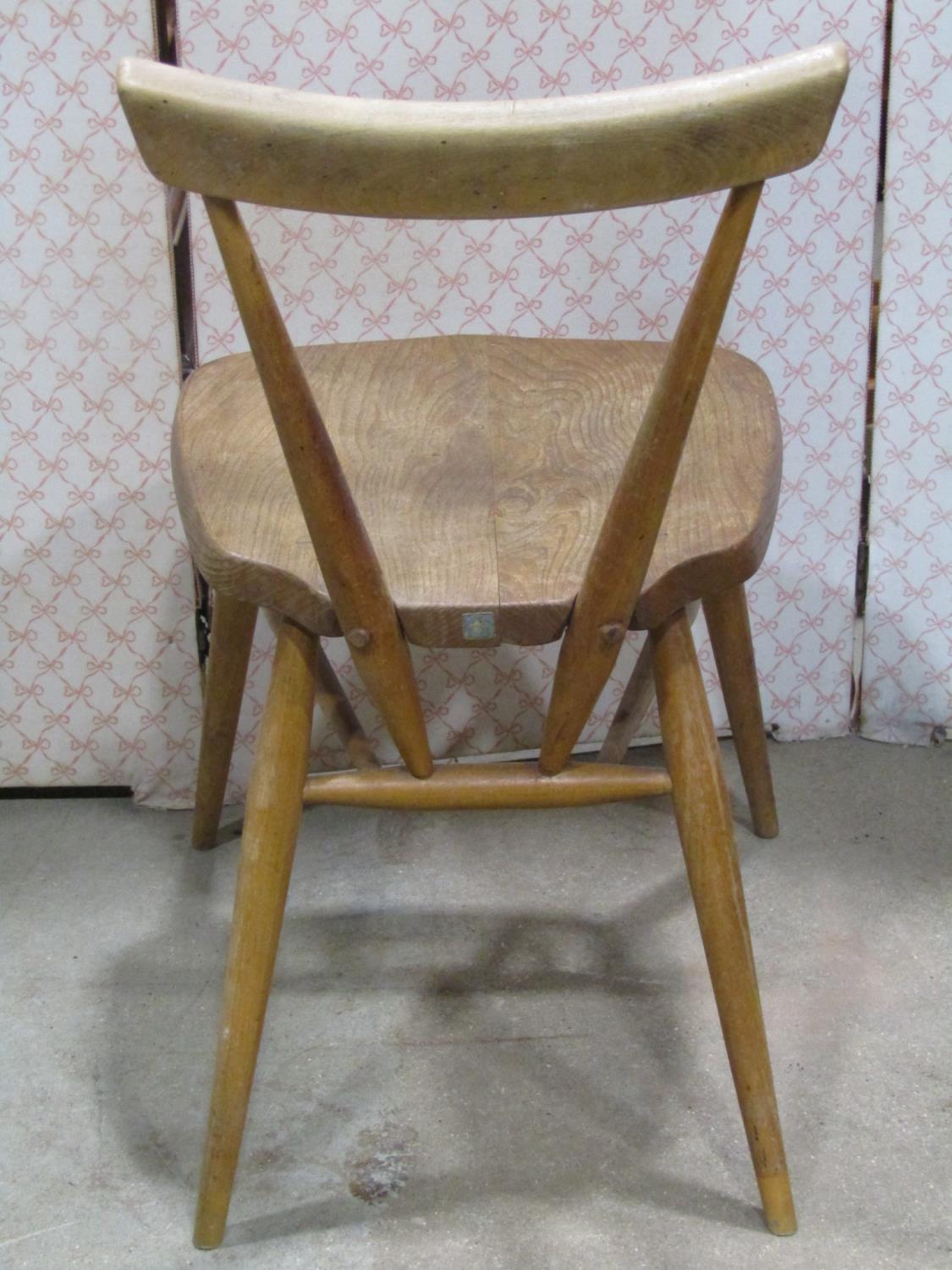 A vintage Ercol elm and beechwood stacking chair - Image 2 of 2