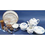 Three piece continental porcelain tea set, teapot, sugar basin and cream jug with applied and
