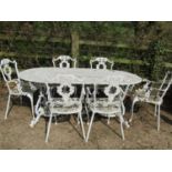 Good quality cream painted cast iron and alloy garden table of oval form with shaped outline and