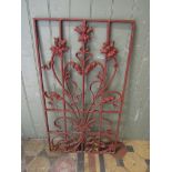 An ornamental cast iron panel with scrolling Art Nouveau style floral detail, 90 cm x 50 cm