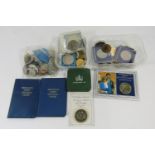 A collection of thirteen cased coins £5 - 50p including Diamond Jubilee, Churchill, Queen