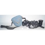 Photographic equipment, including a Canon EOS1000F camera, Minolta X-700 a boxed Fuji Finpix digital