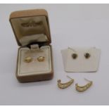 Pair of 14ct earrings with pierced Greek key detail, a pair of 14ct pearl earrings and a further