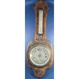 An Art Deco mantle clock in simulated tortoiseshell case with chrome bezel and rectangular dial,