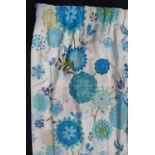 Pair of good quality thermal lined curtains in a contemporary bright print with pencil pleat