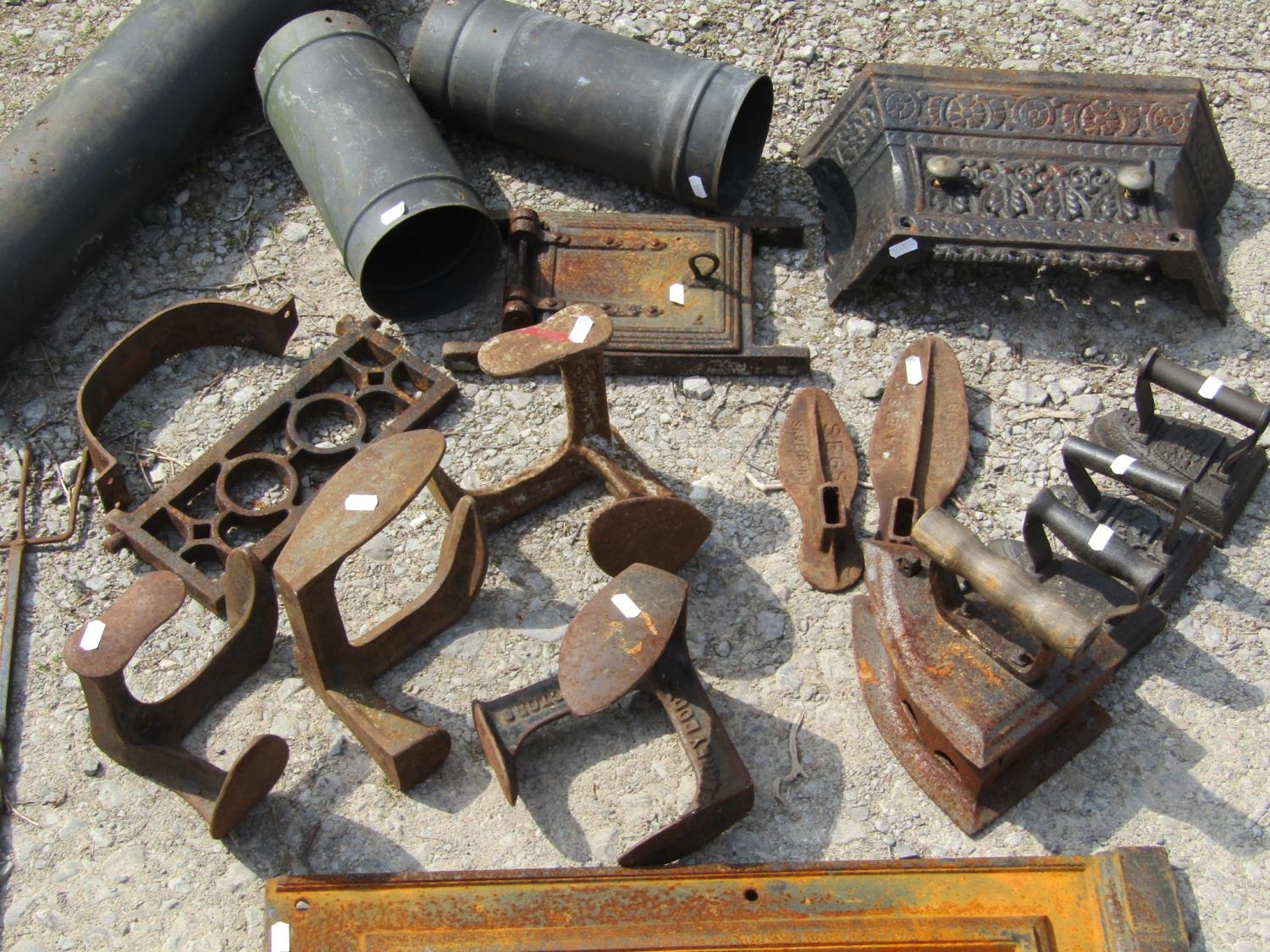 The remains of an antique cast iron range, further fire related items, cast iron flat irons, various - Image 3 of 3