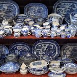 An extensive collection of 19th century and later blue and white printed Willow pattern wares of