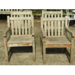Set of four weathered teak garden open armchairs with slatted seats and backs, 60cm wide