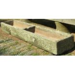 A good weathered natural stone two divisional feeding trough of rectangular form, 156 cm long x 31