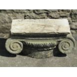 A weathered carved natural stone architectural Doric capital, inscribed 'W Fisher' (51 cm wide x 25