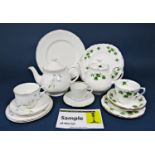 A collection of Colclough Ivy pattern wares including teapot, cake plate, milk jug, two sugar bowls,