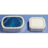 Two silver metal trinket boxes with polished agate lids surrounded by paste stones