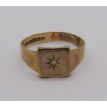 Mid Victorian 9ct diamond set signet ring with star-cut detail, size X/Y, 4.4g