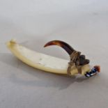 A Solomon Island fish hook with carved shell shank with turtle shell hook and fibre binding. 6cm