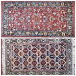 A modern Middle Eastern design carpet with an all over floral pattern. 163cm x82cm approx and