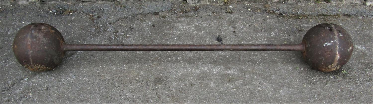 An original vintage cast iron Strong Man Bar Bell, 145cm long