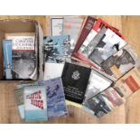 A box containing military booklets and pamphlet from the 8th Army, German Airforce in Maps and