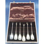 A cased set of six Arum commemorative 1976 Montreal Olympic spoons with gilded athlete detail, 5oz