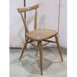 A vintage Ercol elm and beechwood stacking chair