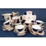 A collection of 19th century gaudy teawares comprising cake plate, milk jug (af) slop bowl, six