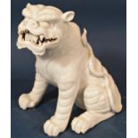 Chinese porcelain tiger with blanc de chine finish and with incised detail, 22 inches high