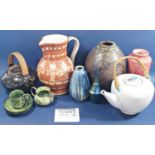 A quantity of studio ware together with two Persian ware dishes, including Zoo Pottery by W Mills