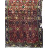 A Bidjar carpet with all over stylised floral pattern design, 270cm x 140cm