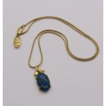 Stylised 18ct opal triplet pendant hung on an associated yellow metal chain necklace