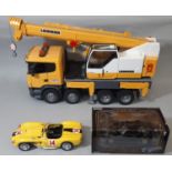 Bruder Scania Liebherr Crane Truck length 6ocm together with a boxed 1997 Pontiac from 'Smokey and