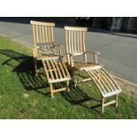 A pair of weathered beechwood folding steamer type chairs with slatted seats and backs stamped