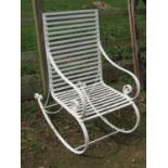 A heavy gauge sprung steel framed garden rocking chair with strapwork seat and combined back with