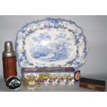 A large 19th century blue and white meat platter, a vintage leather bound Thermos, a millefiori