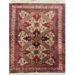 An Ardabil rug with a radiating central motif. 120cm x 97cm approx