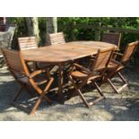 A contemporary stained hardwood D-end pull out extending garden table with centre bi-folding leaf,