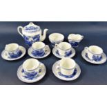 Late 19th century blue and white transfer printed half size tea set for six with printed landscape