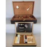 A Joseph Samuel & Son Ltd cigar humidor, a selection of cigars, including four H. Upmann Habana