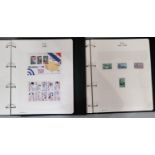 Two good quality albums of Mint USA stamps - to 2005. Good FV.