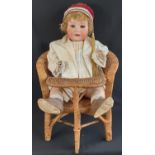 Early 20th century German bisque head character doll by Ernst Heubach (mould 300.12), with 5 piece