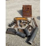 The remains of an antique cast iron range, further fire related items, cast iron flat irons, various