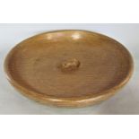 A Robert 'Mouseman' Thompson oak fruit bowl with an adzed outside finish and central signature