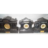 Three Victorian black slate mantle clocks of architectural form all with eight day striking