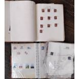 A stamp album containing British and worldwide stamps dating from QVI, including penny red and two