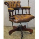 Reproduction style office chair with tan coloured button back