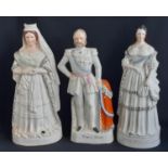 Three 19th century Staffordshire flat-back ceramic figures including King and Queen of Prussia and