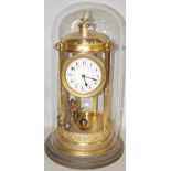 A late 19th century 400 day anniversary clock with reeded column supports, painted dial, glass