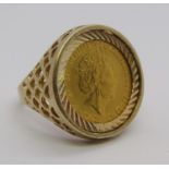 9ct ring set with a 1/10oz gold Britannia coin, dated 2019, size J, 6.2g