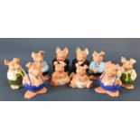 Wades Westminster Piggy Bank family comprising two of each - Father, Mother, Daughter, Brother and
