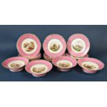 A collection of 19th century cabinet plates and comports with gilt and pink banding each depicting a