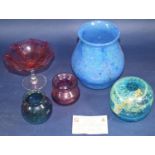 An early 20th century cranberry glass comport, a Monart variegated blue and green vase with